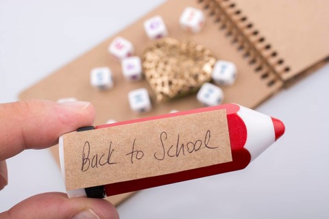 Back to school theme with a red apple