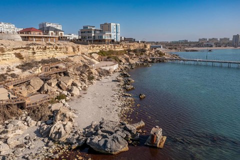 Aerial of the sandstone cliffs and promenade in Aktau