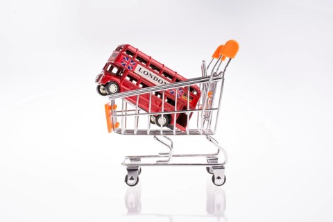 Model London Bus in a Shopping Cart