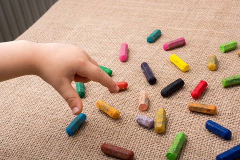 Used color crayons and a toddlers hand pointing