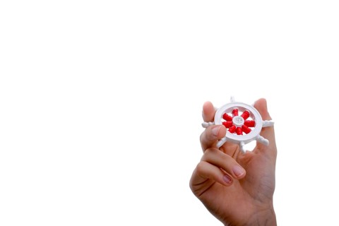Isolated Ship steering wheel onhand