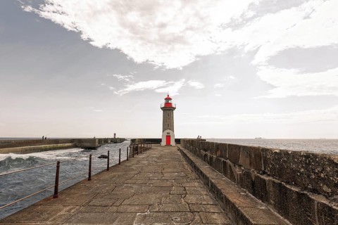 Pier and lighthouse Farolim de Felgueiras at the mouth of the Douro