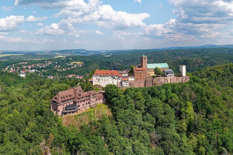 On the left Wartburg Gasthof. Hotel