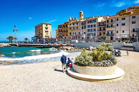 Artificial pebble beach in the old harbour of Porto Santo Stefano