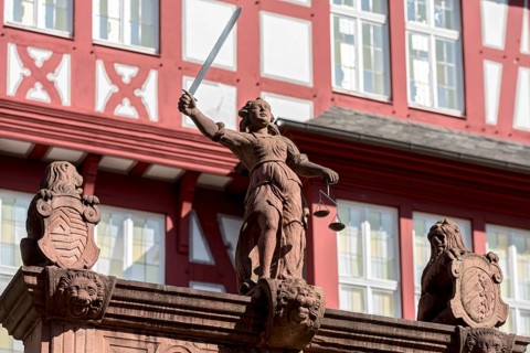 Justitia with scales and sword