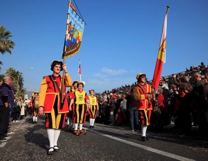 Traditional traditional costume group at the street parade in Menton