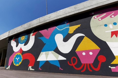 Colourful mural with fantasy figures by graffiti artist Mariana Malhao