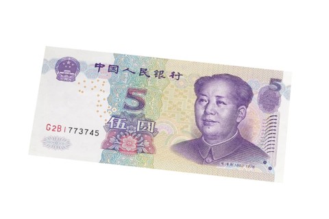 Five Yuan banknote on a white background