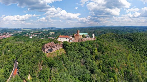 On the left Wartburg Gasthof. Hotel