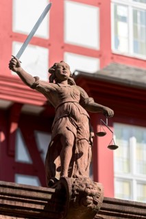 Justitia with scales and sword