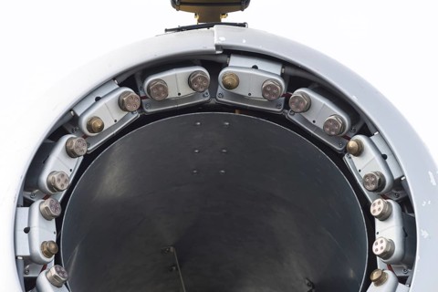 Nozzles on the inner rim of a propeller gun