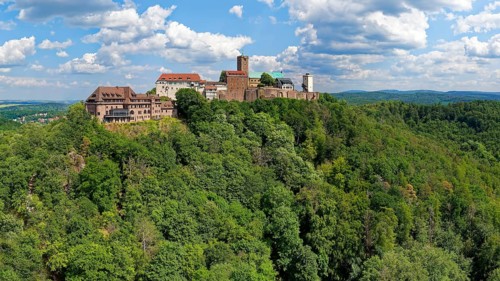 On the left Wartburg Gasthof. Hotel
