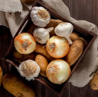 Top view garlic onions crate