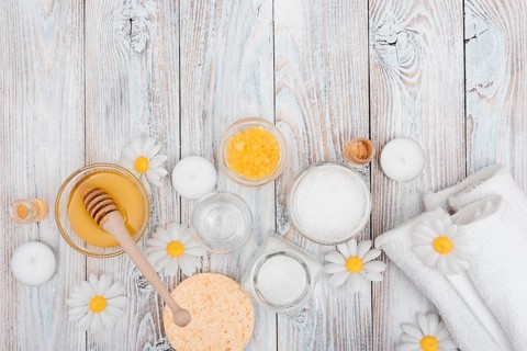 Wooden background with spa essentials