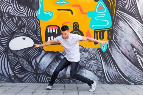 Young man dancing street
