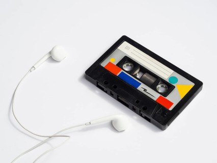 Colorful vintage cassette tape with headphones