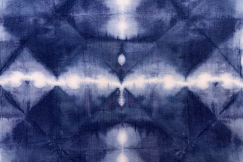 Flat lay colorful tie dye textile