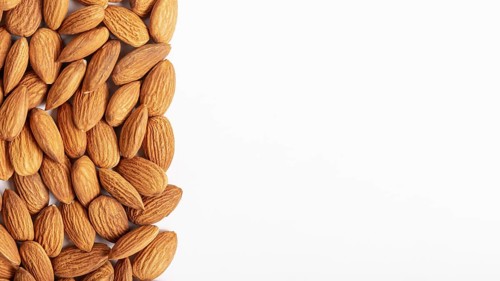 Flat lay almonds with copy space