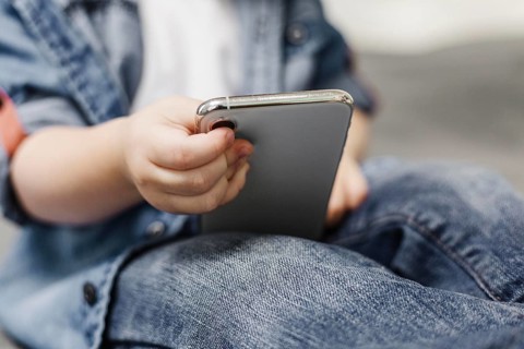 Child using mobile phone