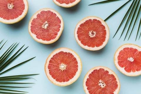 Top view grapefruits with leaves