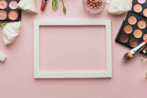 Flat lay assortment make up products frame
