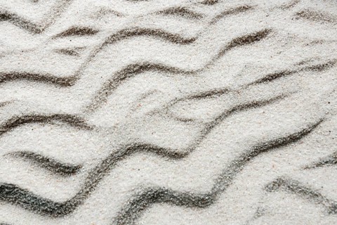 Close up sand with wavy lines