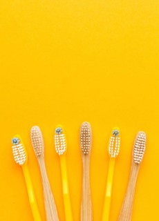 Top view collection organic toothbrushes with copy space