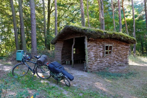 Rest hut made of natural materials in the forest
