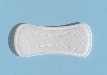 Flat lay clean pad blue background
