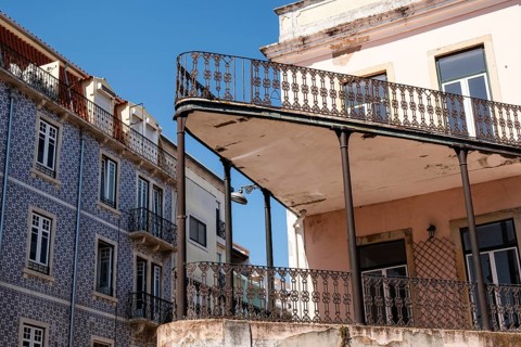 Wrought iron balcony on a house in the old town of Lisbon