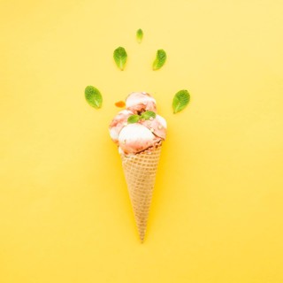Ice cream waffle cone with syrup mint