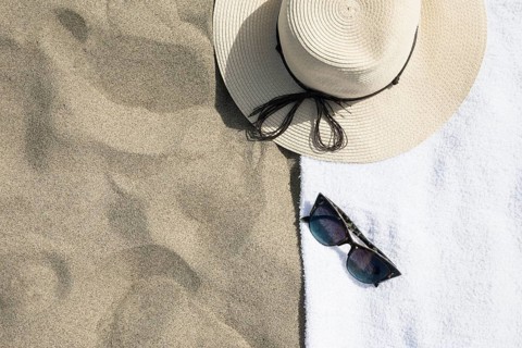 Top view hat beach towel