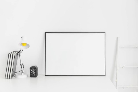Stylish minimalistic workplace white color with whiteboard