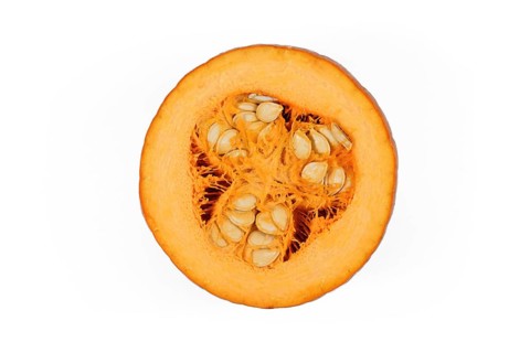 Open 'Baby Bear' Halloween pumpkin showing vegetable meat and seeds inside