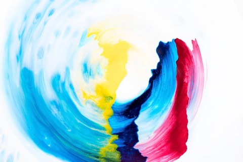 Decorative watercolor brush strokes circular form white paper