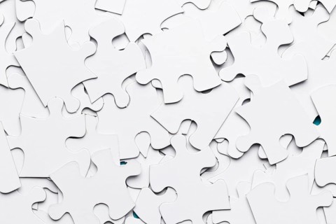 Full frame jigsaw puzzle piece backdrop
