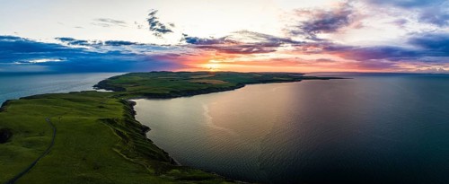 Panorama of Sunset over Mull of Galloway Lighthouse from a drone