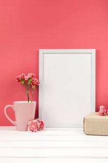 Carnation flowers gift box cup white empty frame table
