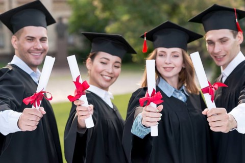 Portrait group students celebrating their graduation