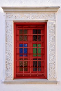 Old window of some christian church. Colorful stained glass