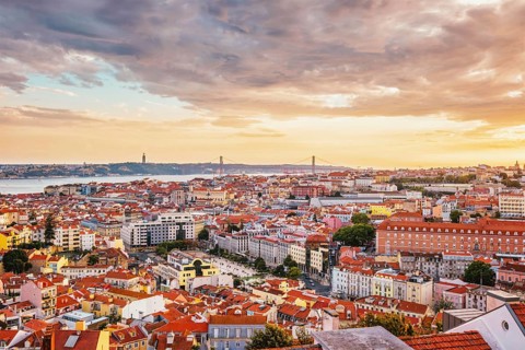 View of Lisbon famous view from Miradouro da Senhora do Monte tourist viewpoint of Alfama and Mauraria old city district