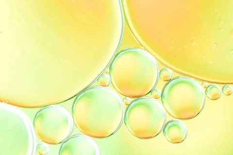Green yellow bubbles glowing drops