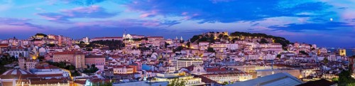 Panorama of Lisbon famous view from Miradouro de Sao Pedro de Alcantara tourist viewpoint in the evening. Lisbon