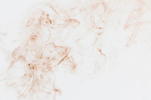 Wisps tan smoke
