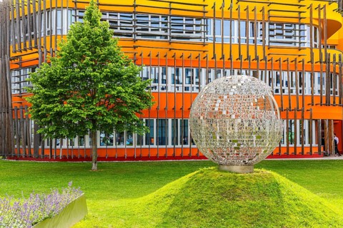 NS memorial on green hill on the campus of the University of Economics WU