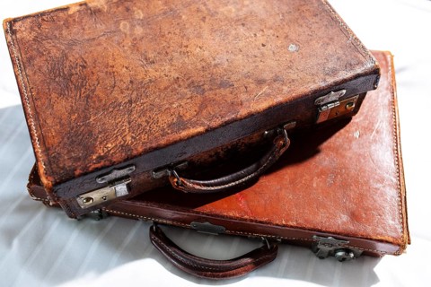 Two old leather suitcases with many traces of use
