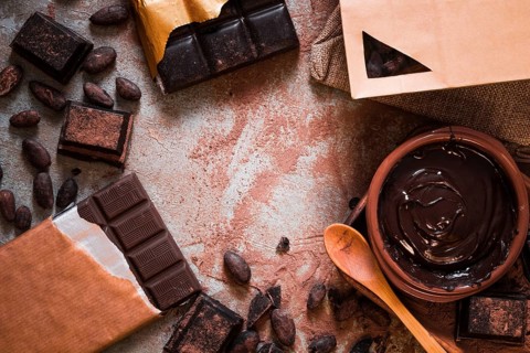 Chocolate bar cocoa beans chocolate cream table