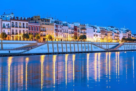 Triana neighbourhood on the banks of the Guadalquivir River at dusk