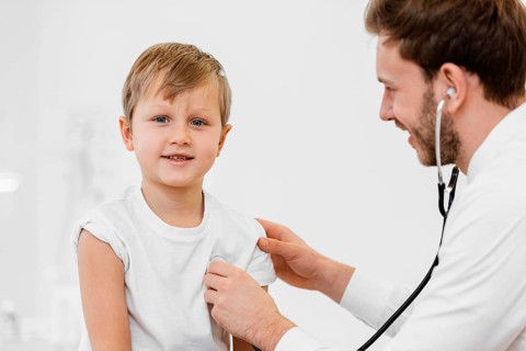 Doctor checking hear beat
