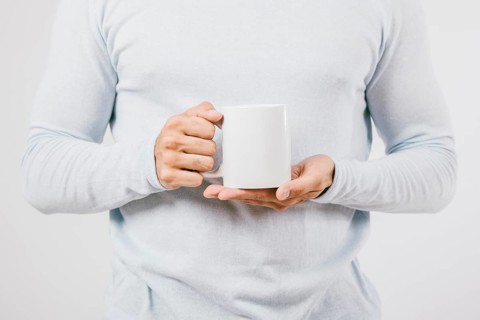 Male hands coffee mug